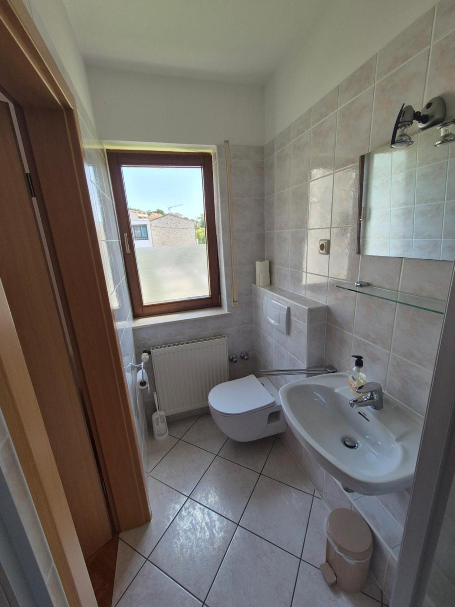 Apartments And Rooms Mamic Dugi Rat Esterno foto